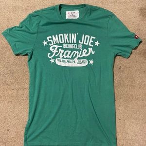 Under Armour - Roots of Fight - Smokin’ Joe Tee